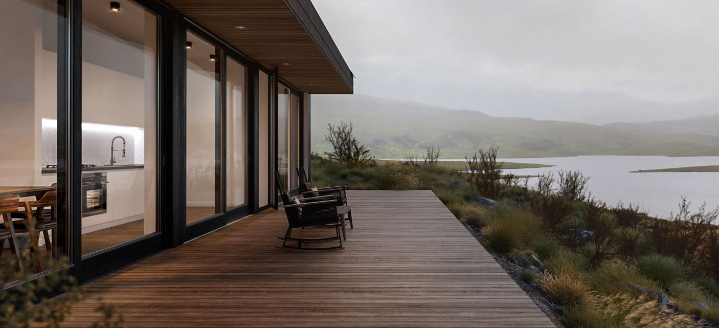 Organic modern home with ipe wood deck overlooking a lake with rolling hills in the background